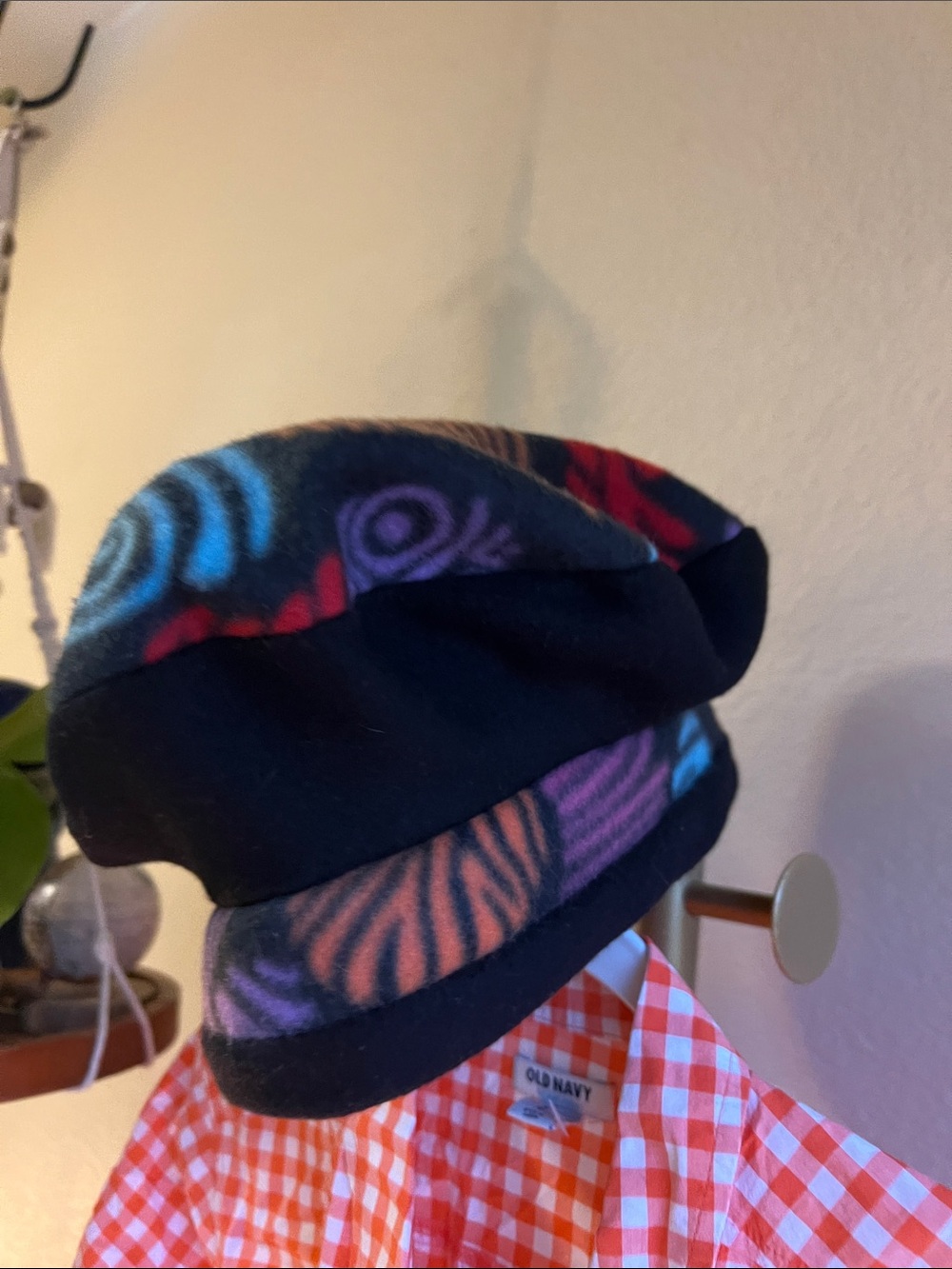 Black Fleece Hat with Multicolor Swirl Accents
